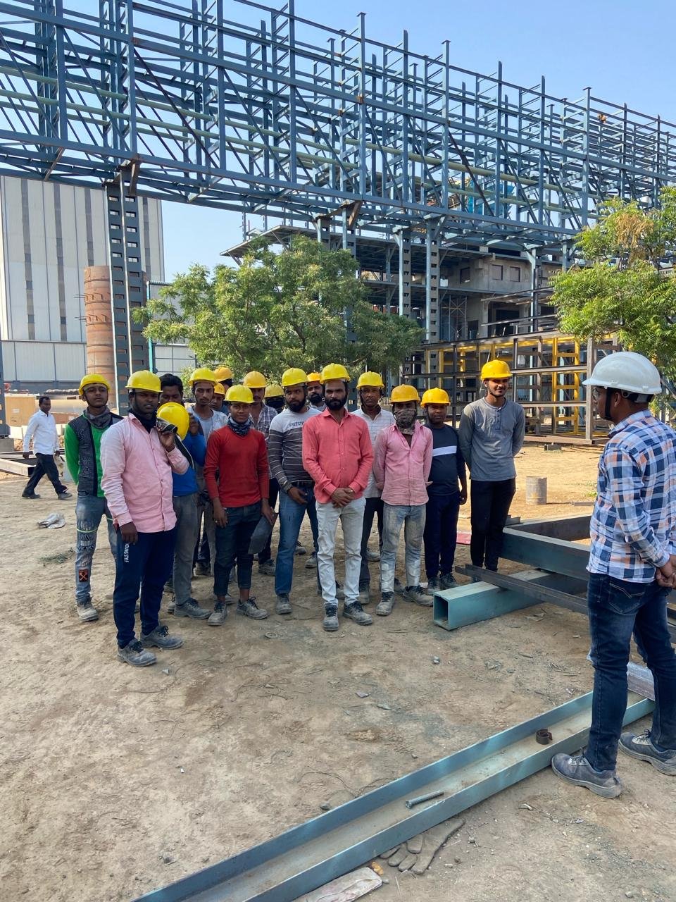 Al Nizami team attending a project safety briefing